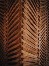 a close up of a wall made of wooden planks
