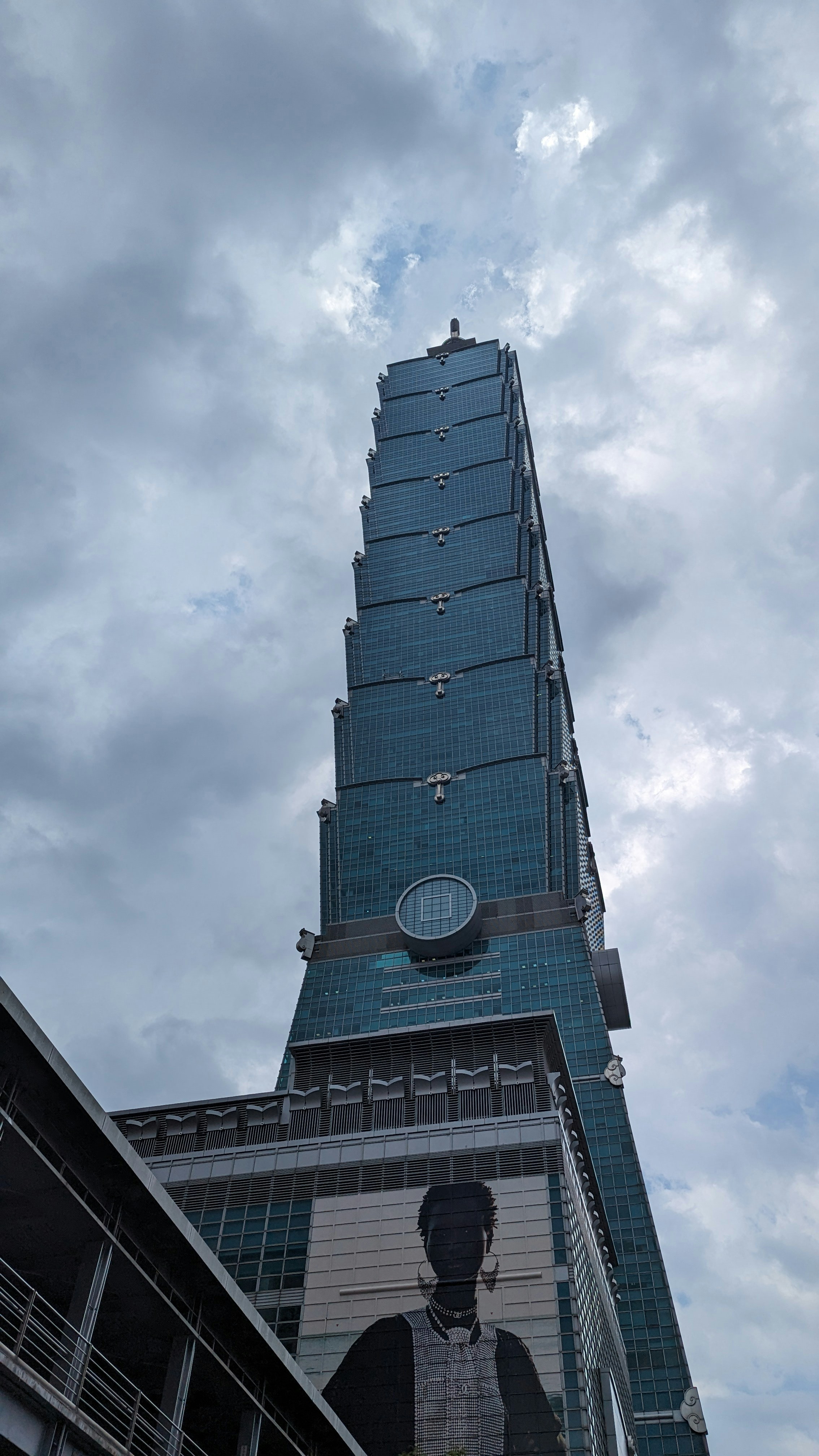 a tall building with a clock on the side of it