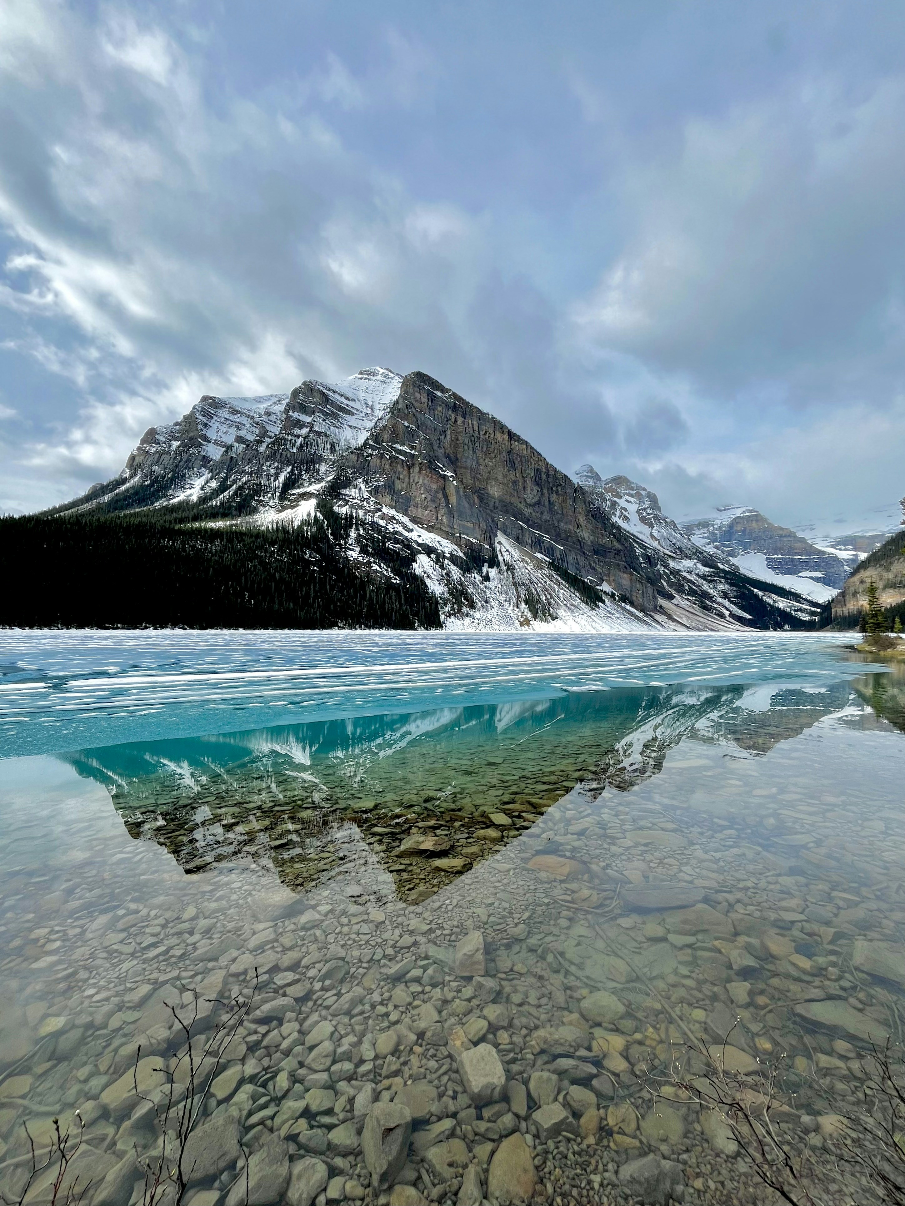 a mountain is reflected in the water of a lake