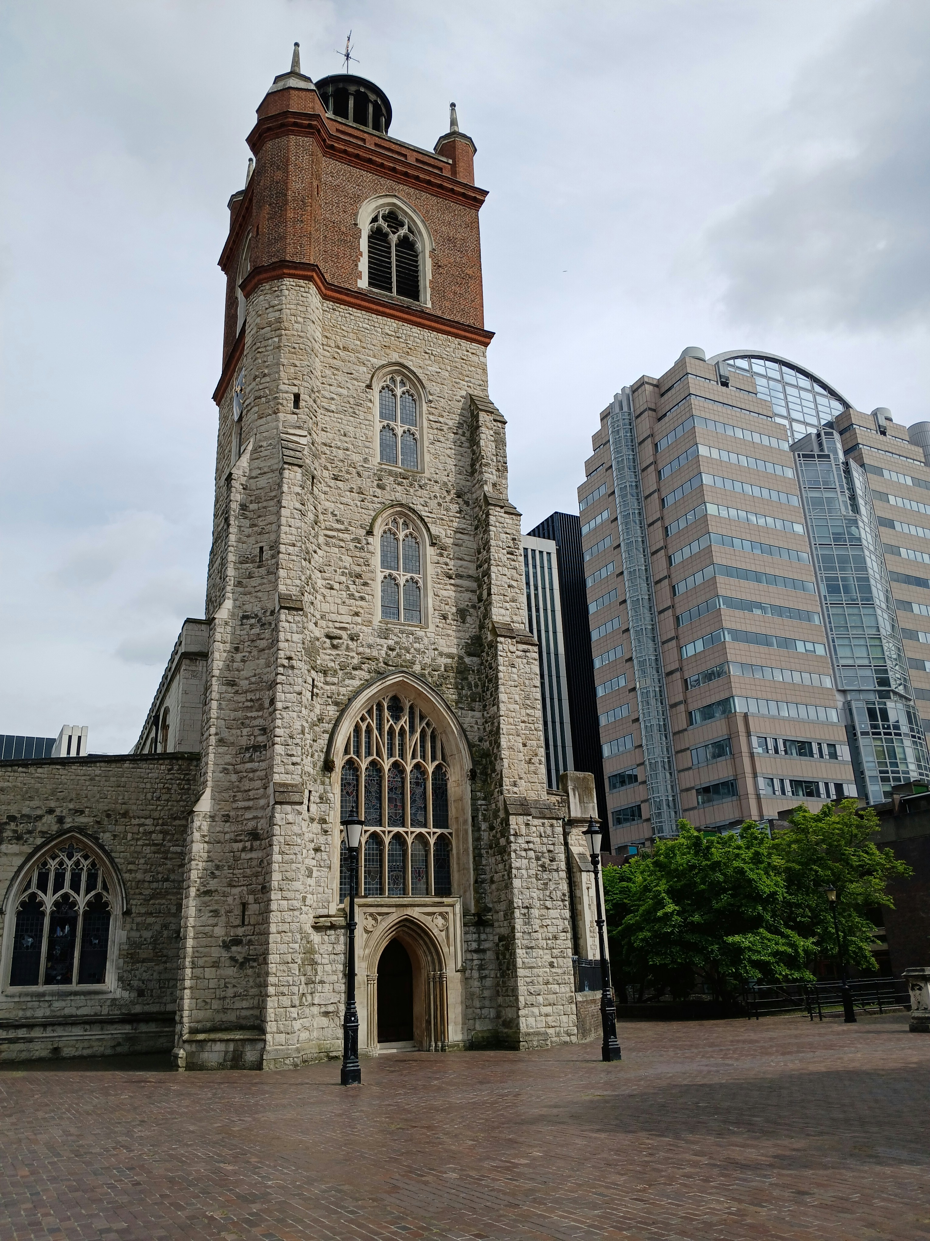 a tall tower with a clock on the top of it