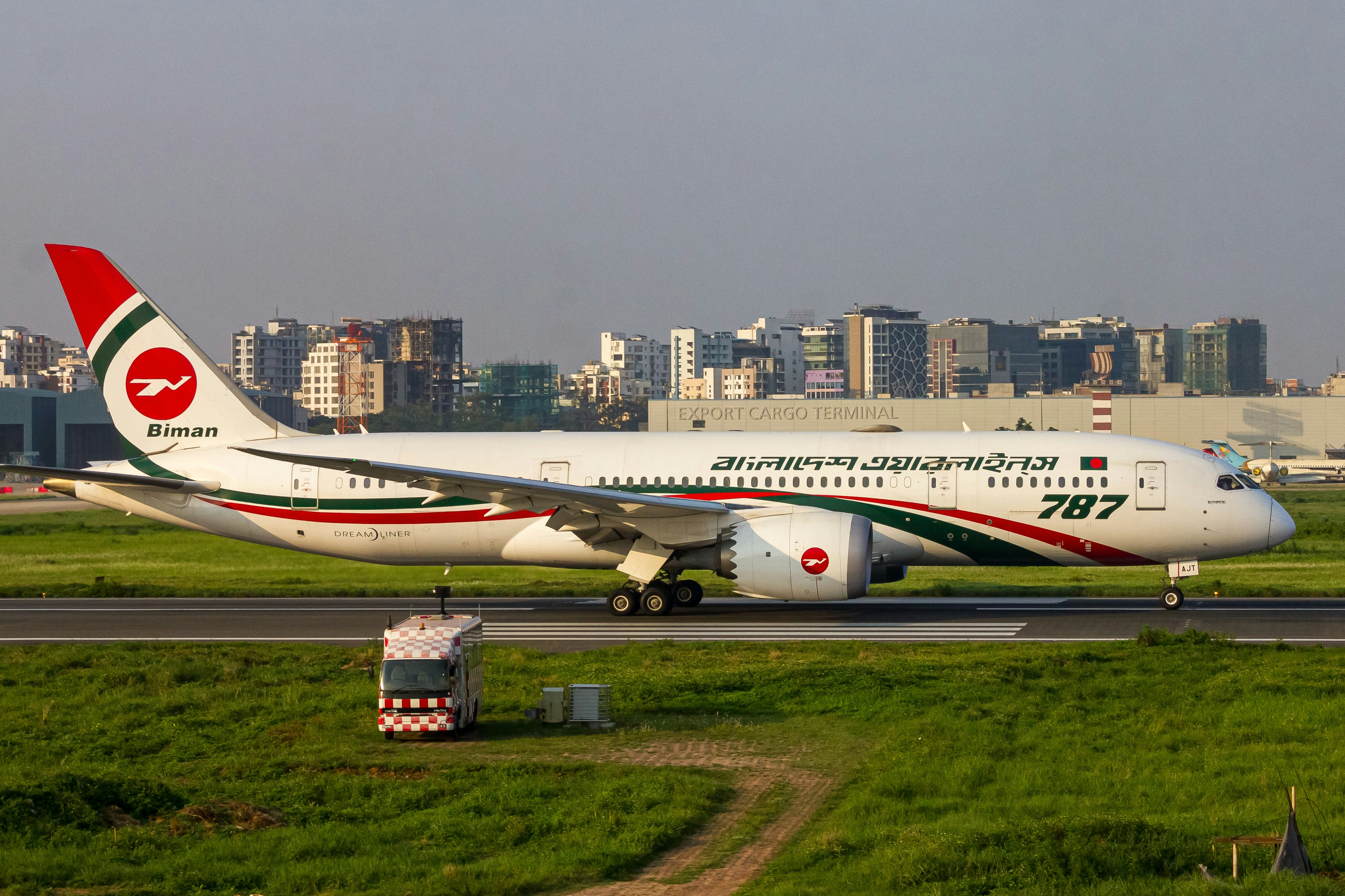 a large jetliner sitting on top of an airport runway