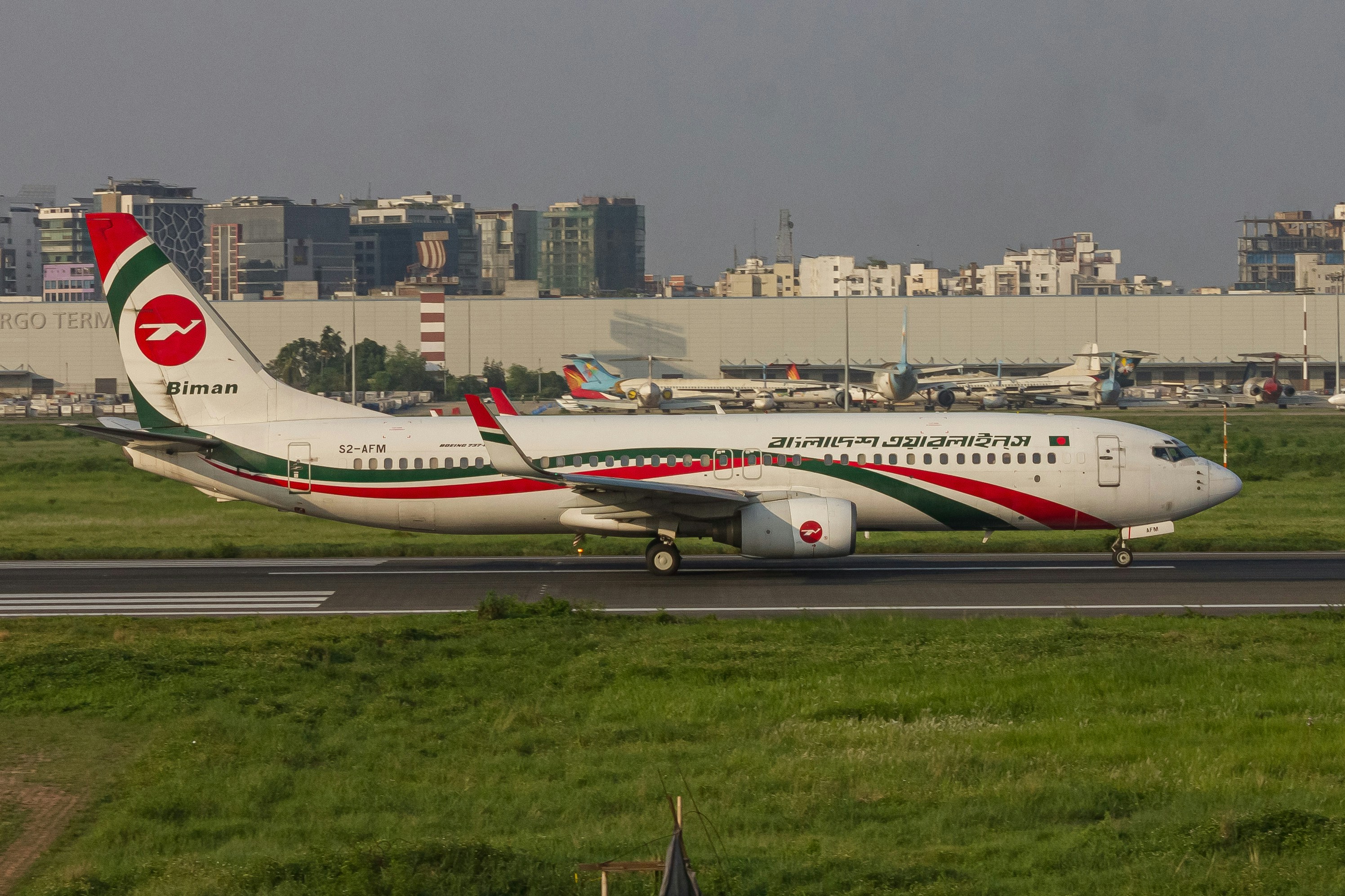 a large jetliner sitting on top of an airport runway