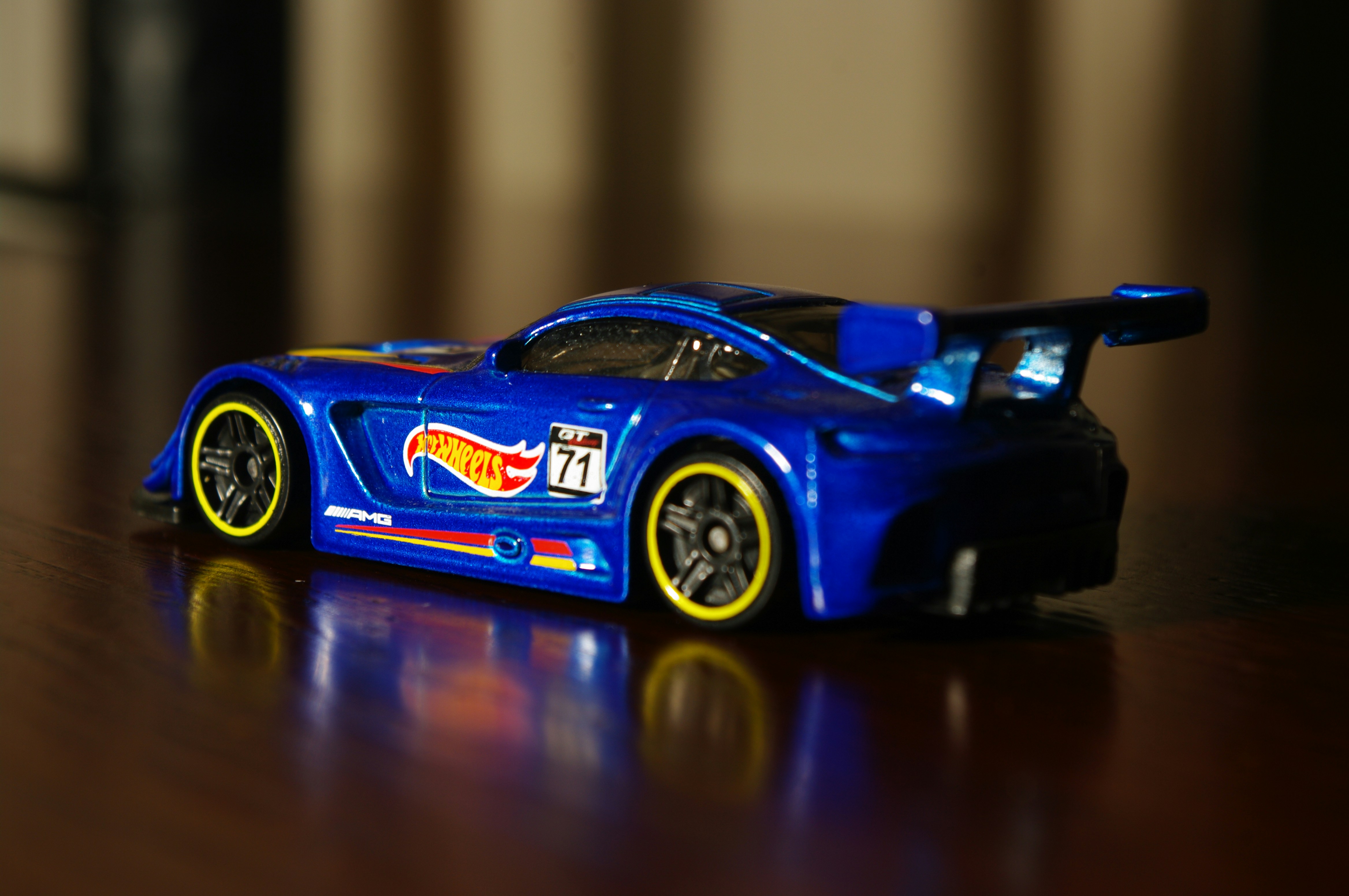 Blue race car collectible model with metallic finish