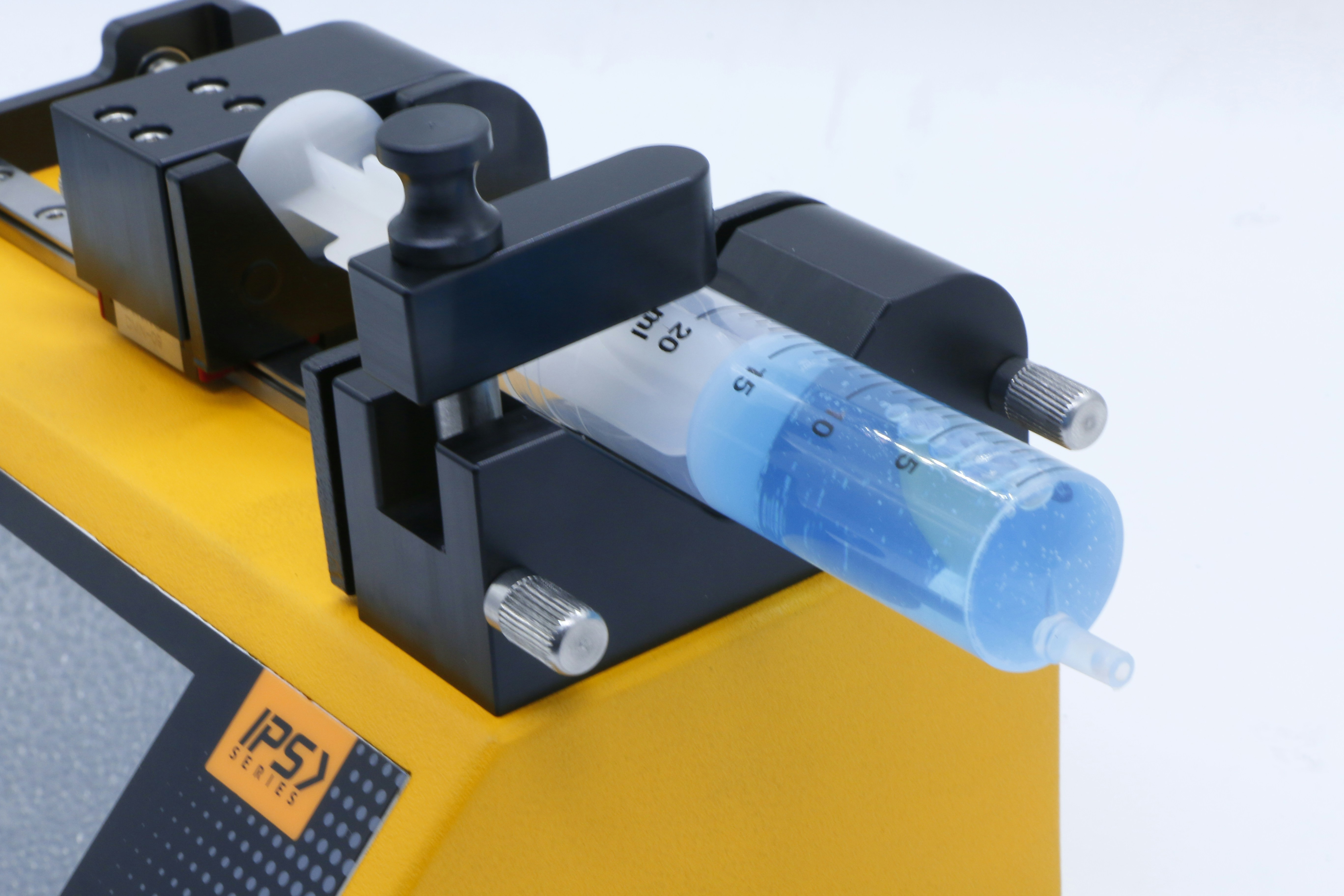 Glass burette with precise graduation markings filled with blue solution, laboratory setting, clean white background