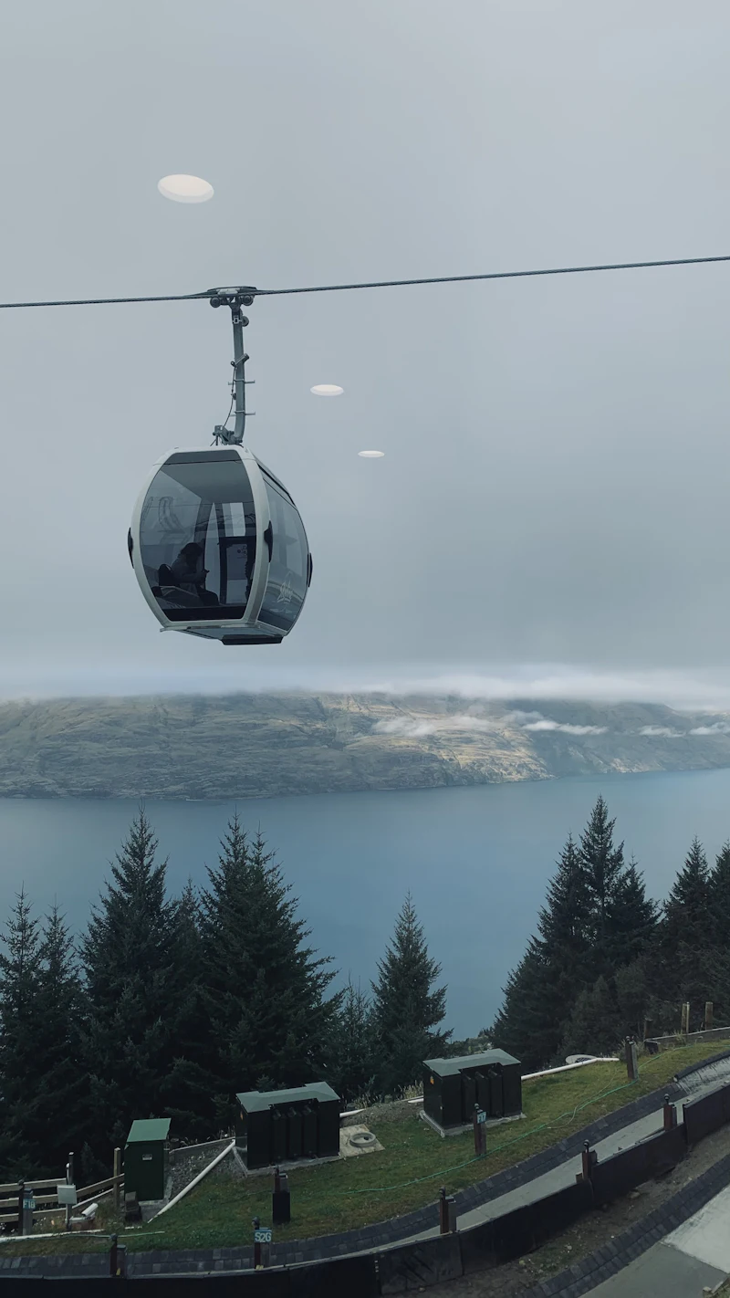 A gondola cabin with Lake Wakatipu below