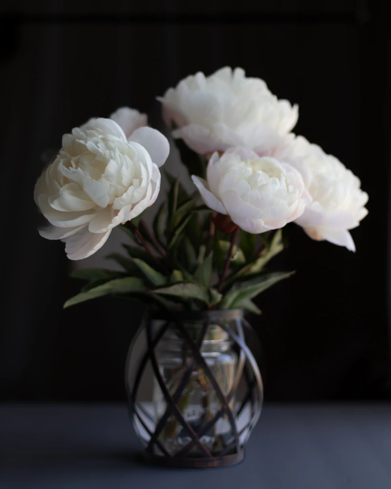 Elegant white peony wedding centerpiece in a vase