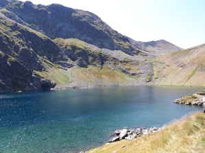 a large body of water surrounded by mountains