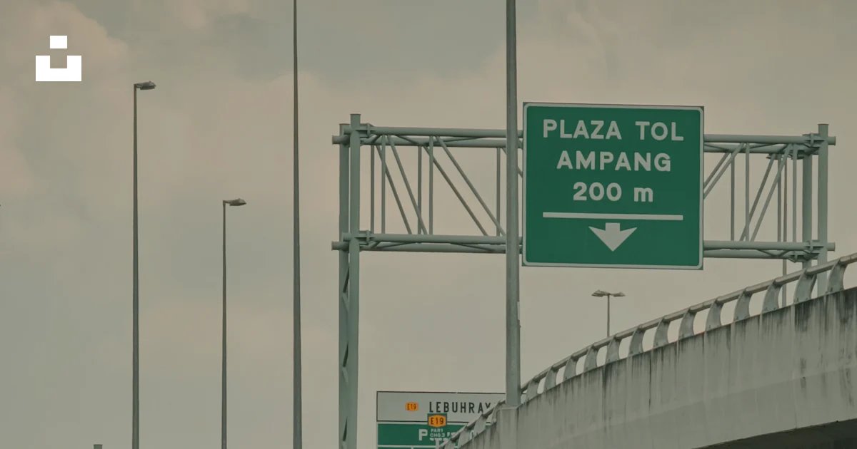 Overpass Signage An overpass with a highway sign above it photo – Free Road Image on ...