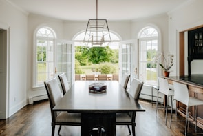 a dining room with a table and chairs