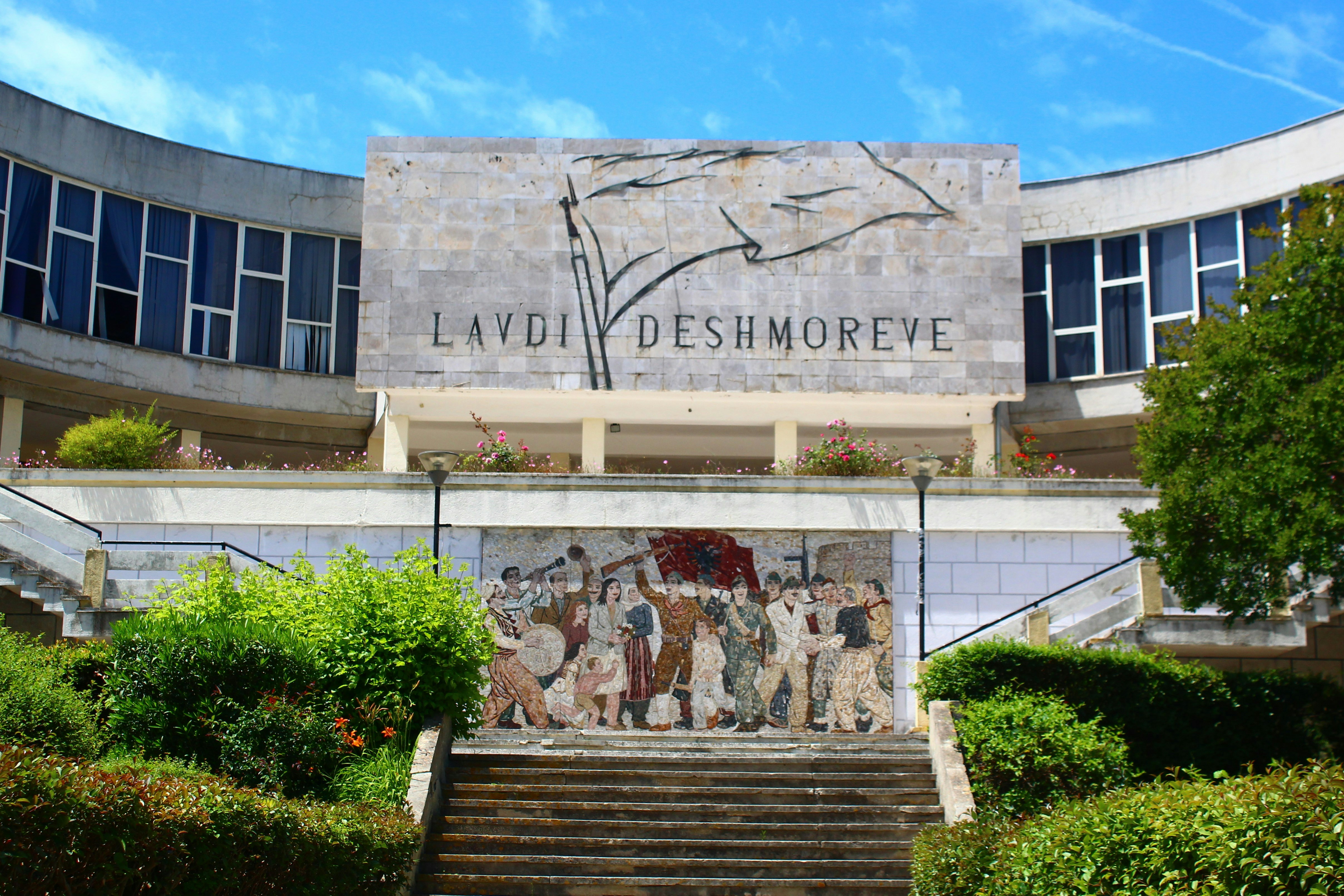 A building with a mural on the side of it