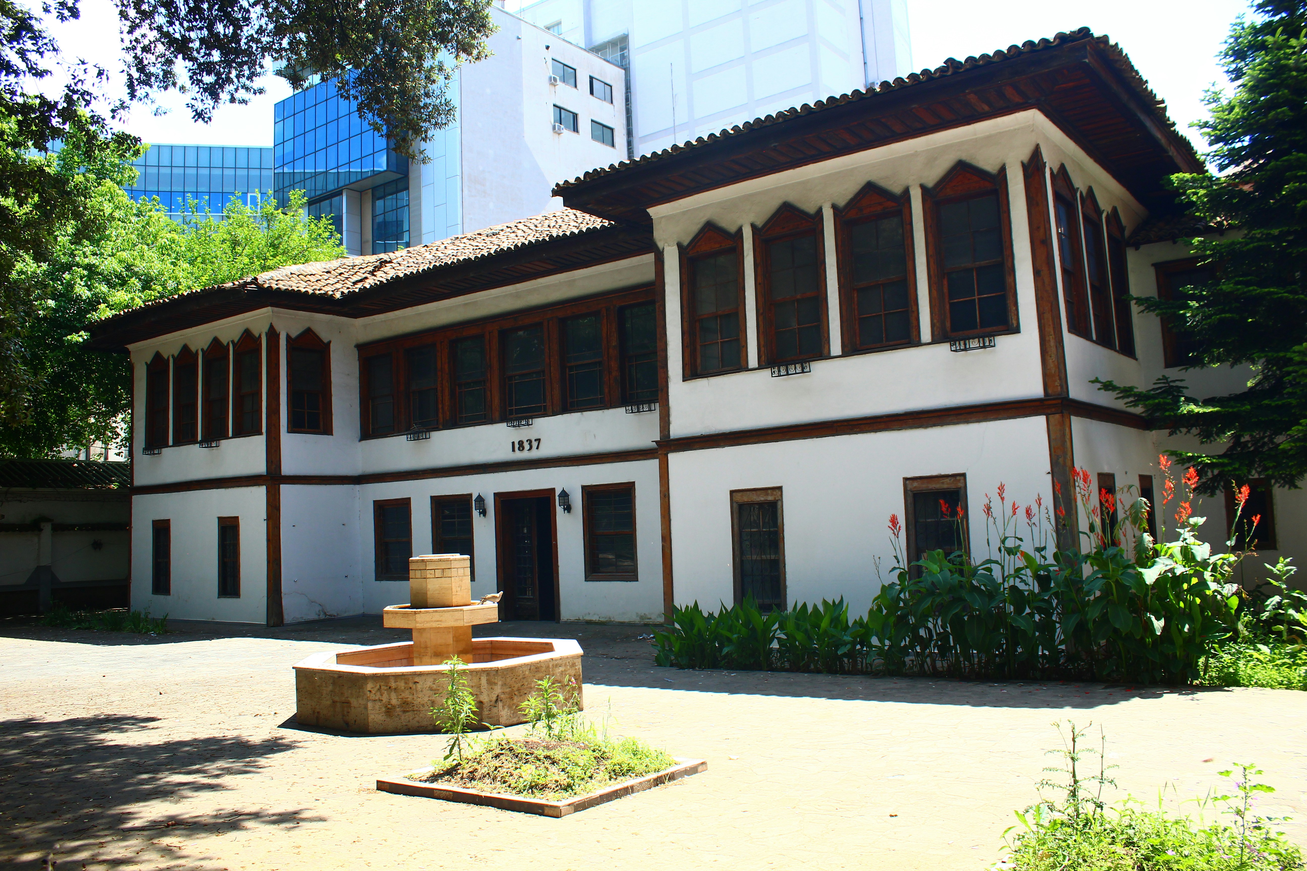 a building with a fountain in front of it