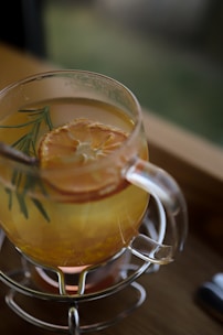 a close up of a drink in a glass on a table