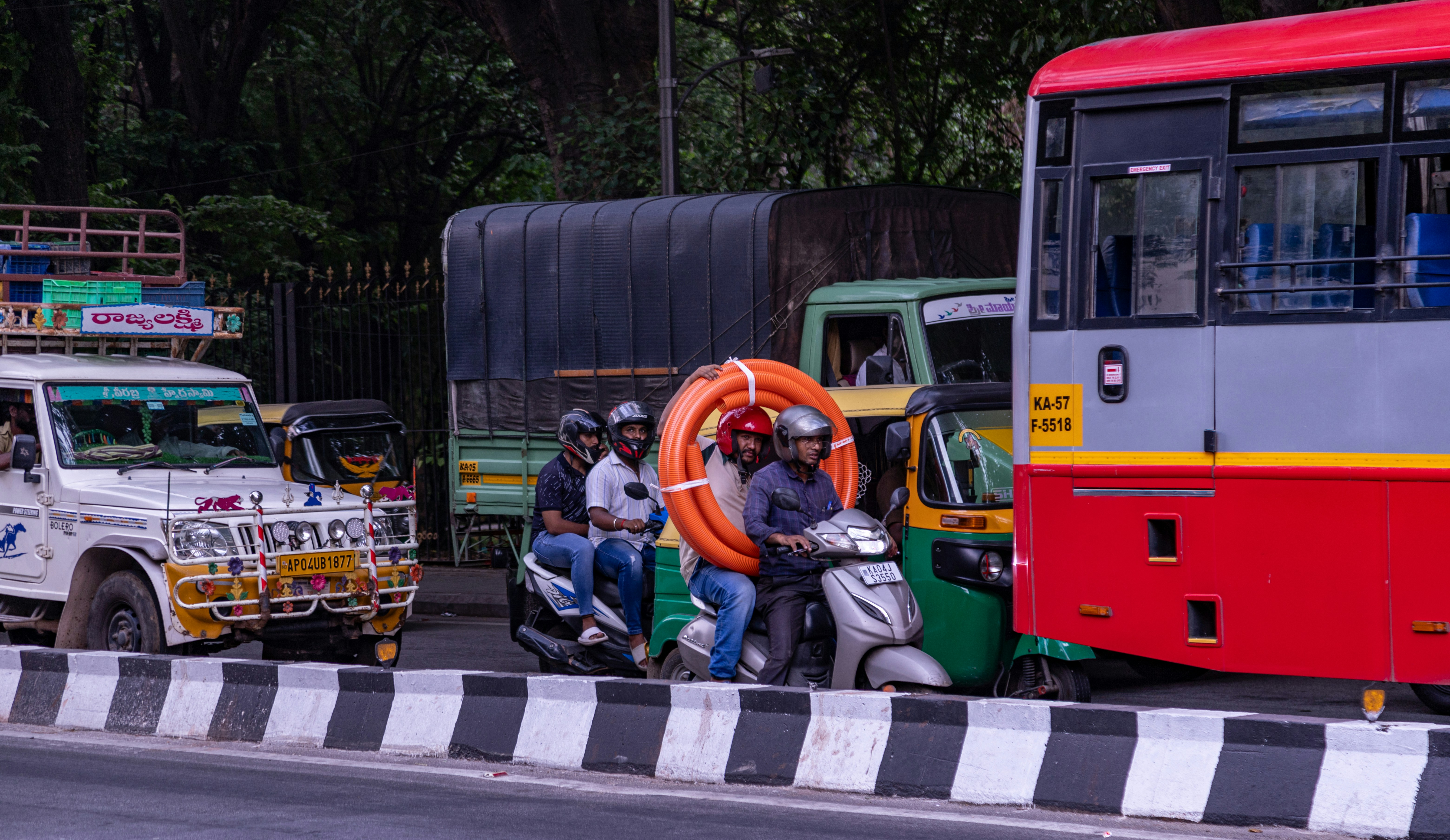a group of people riding on the back of a motorcycle