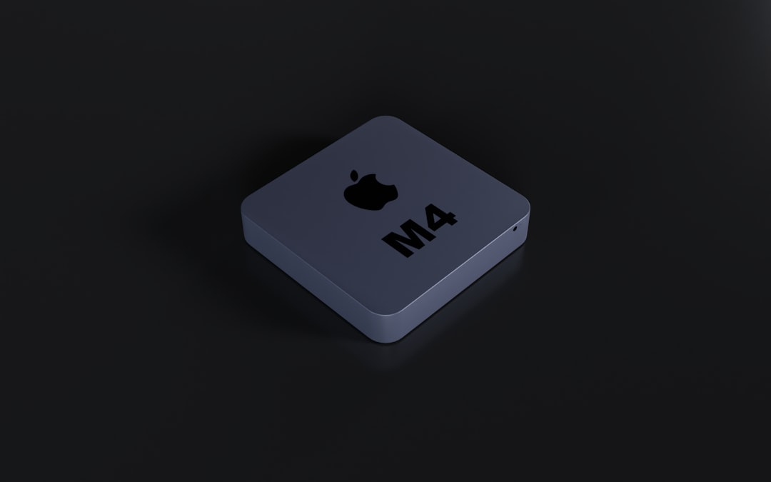 an apple logo is shown on a black surface, Mac Mini, Mac Mini M4, Apple, M4, Chip M4, Chipset M4, Technology, Mini Computer, Compact PC, High Performance, Innovative Design, Advanced Computing, Small Form Factor, Powerful Processor, Efficient Performance, Next Generation Tech, Mac OS, macOS Sonoma, Apple M4, Artificial Intelligence, High Performance, Compact Design, Advanced Computing, Innovative Technology, Personalization Tools, Gaming Features, Enhanced Security, Video Conferencing, Interactive Widgets, Stunning Screen Savers, Efficient Performance, Next Generation Tech
