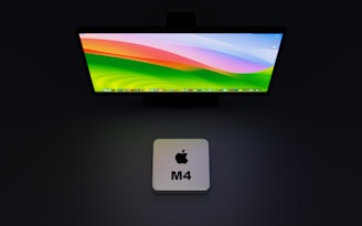 a computer monitor sitting on top of a desk