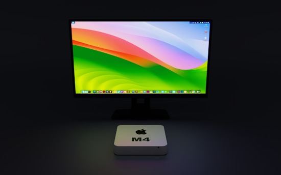 a computer monitor sitting on top of a desk
