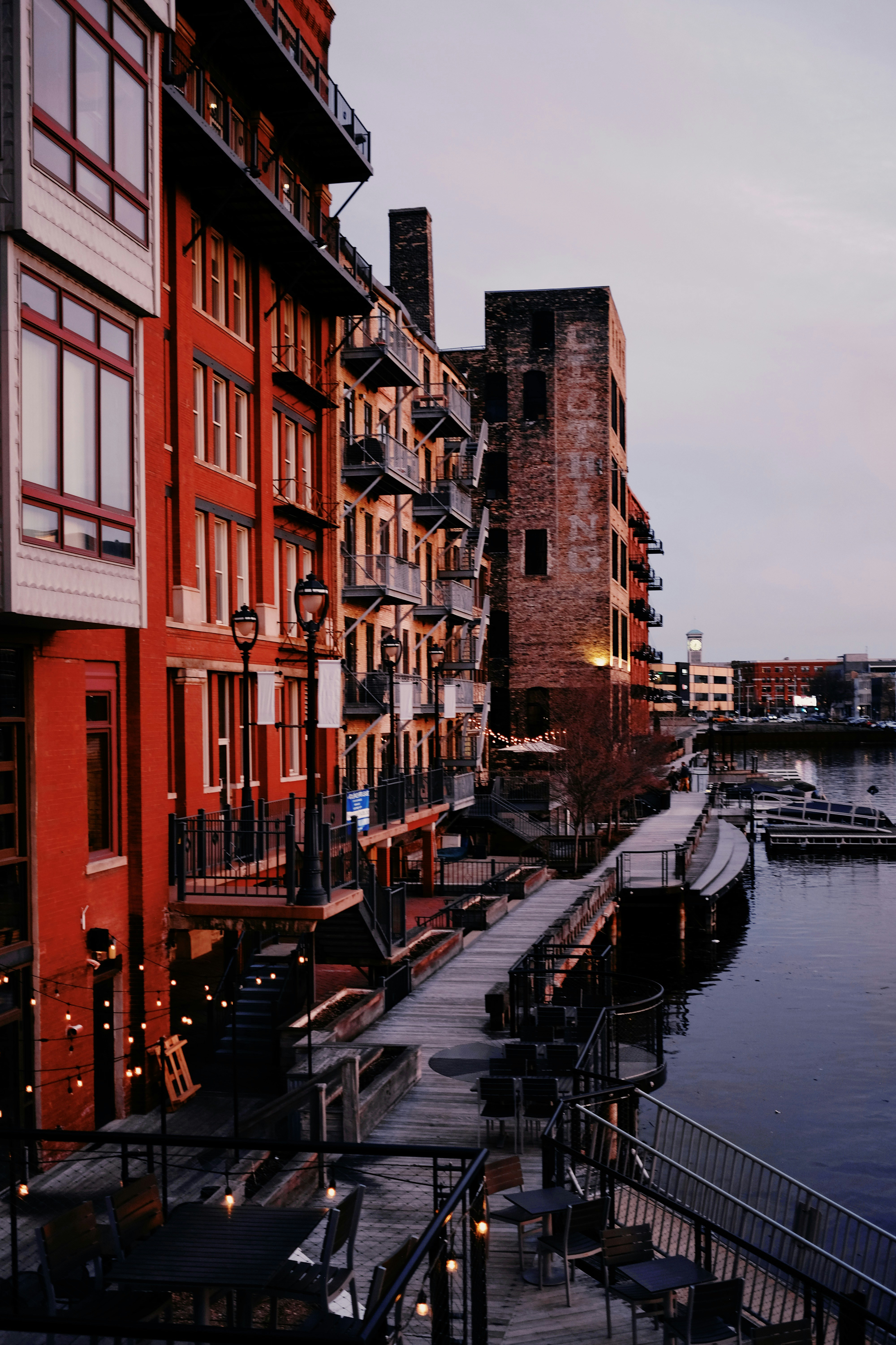 a river with a bunch of buildings next to it