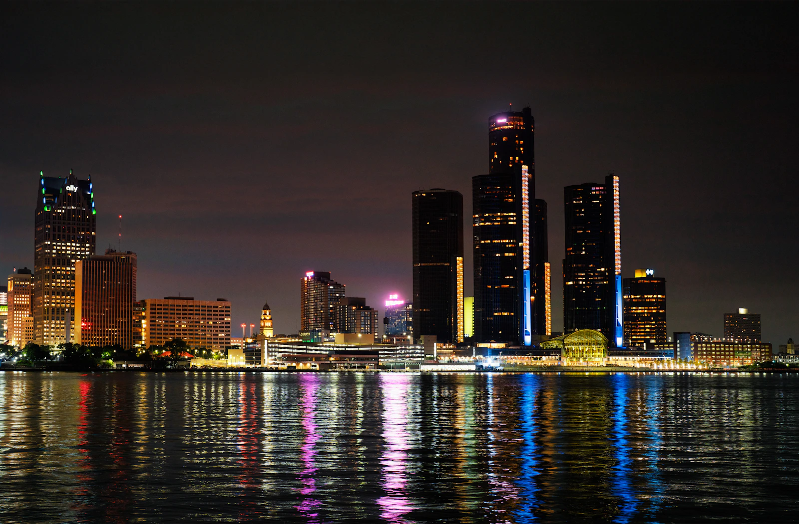 Detroit skyline reflected in the Detroit River at night