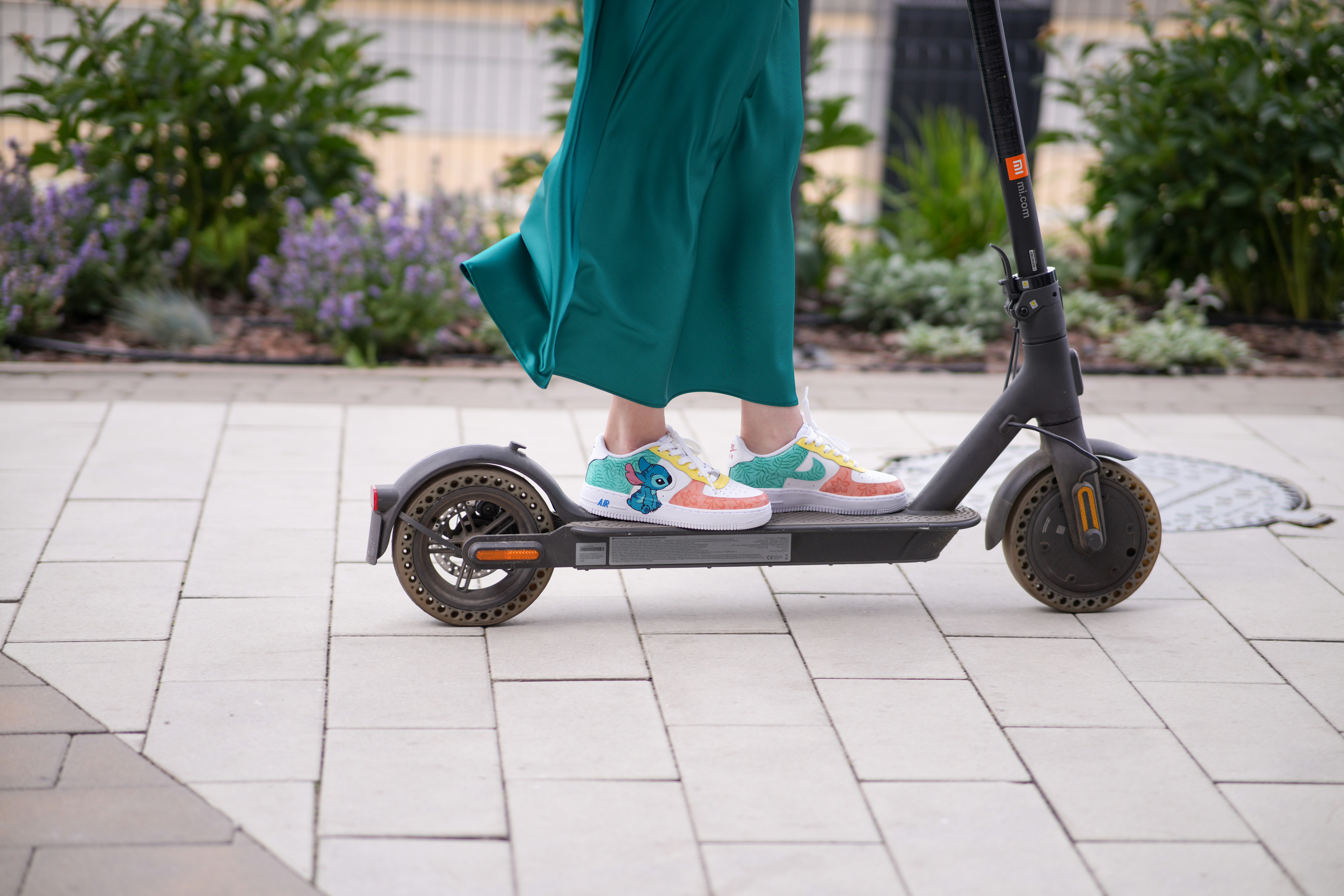 woman wearing yellow long-sleeved dress under white clouds and blue sky during daytime