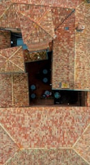 an aerial view of a building made out of bricks