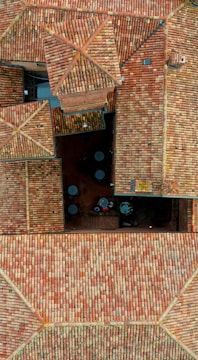 an aerial view of a building made out of bricks
