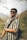a man with a backpack and sunglasses on