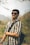 a man with a backpack and sunglasses on