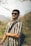 a man with a backpack and sunglasses on