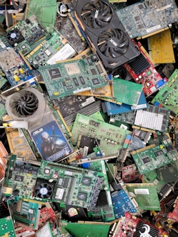 a pile of assorted electronic components sitting on top of each other