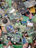 a pile of assorted electronic components sitting on top of each other