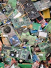 a pile of assorted electronic components sitting on top of each other