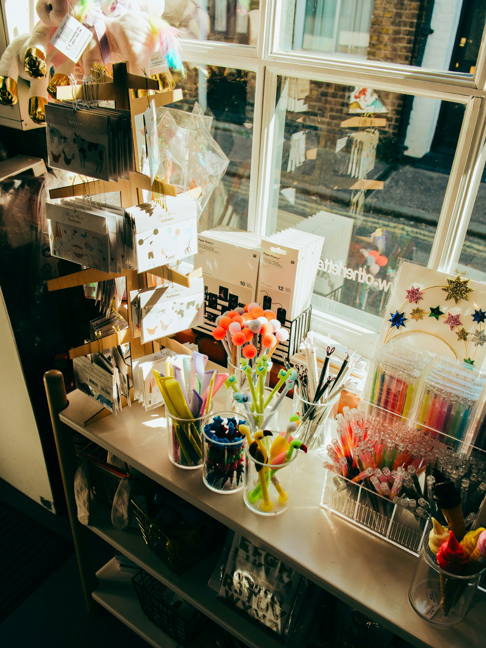 a table with a bunch of craft supplies on it