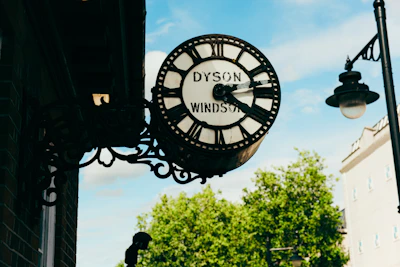 a clock that is on the side of a building