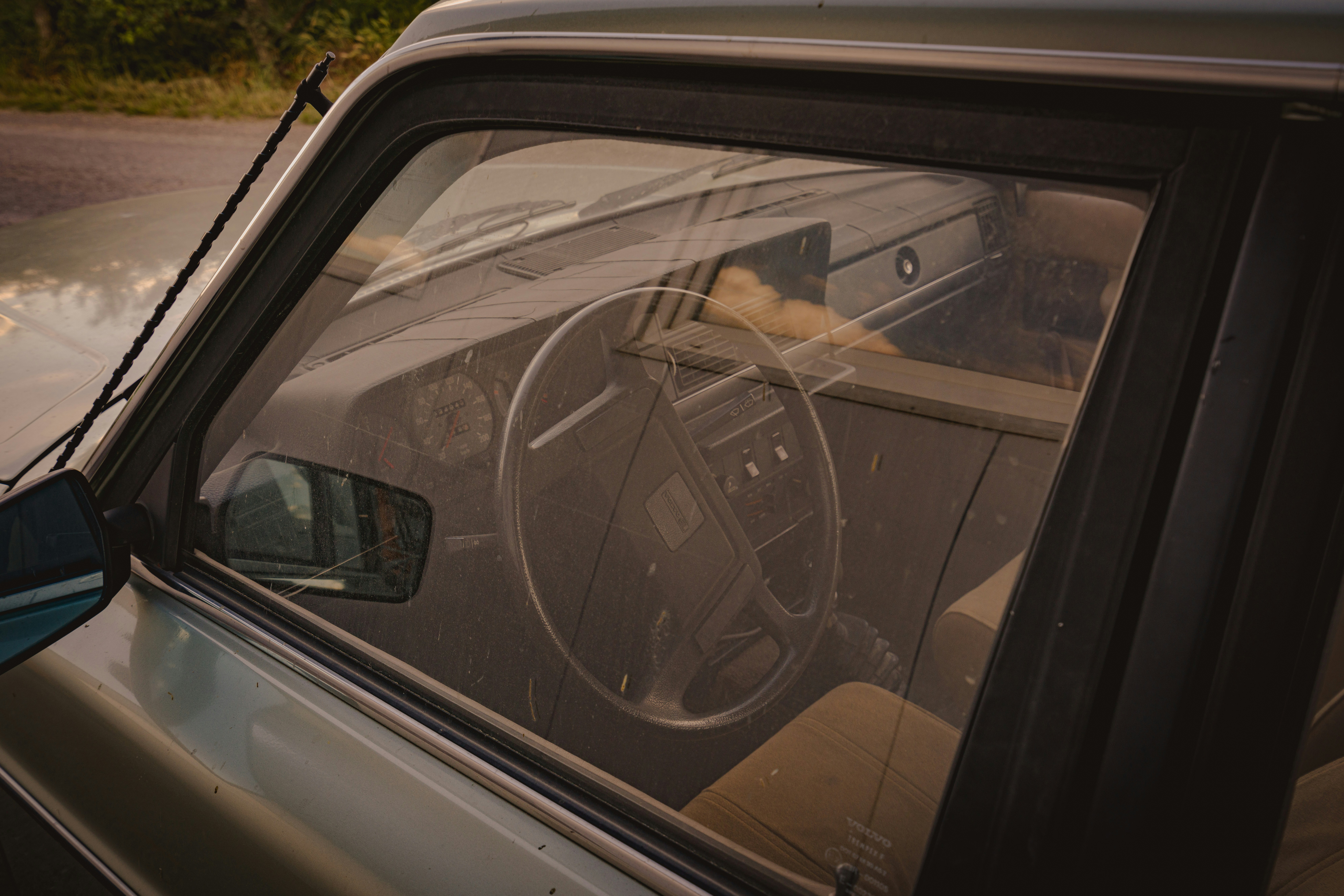 a car with a steering wheel on the dashboard
