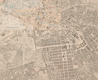 An old map showing a city's layout and waterways