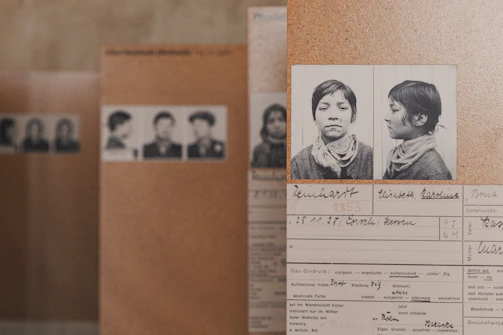 a group of papers with pictures of women on them