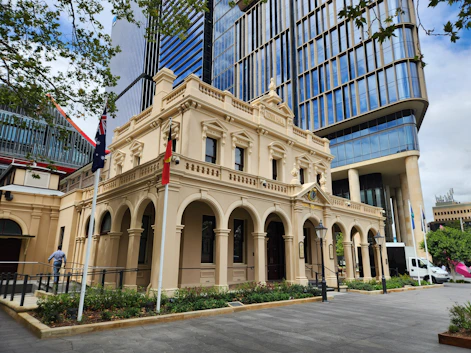 Parramatta an old building with a flag on the front of it