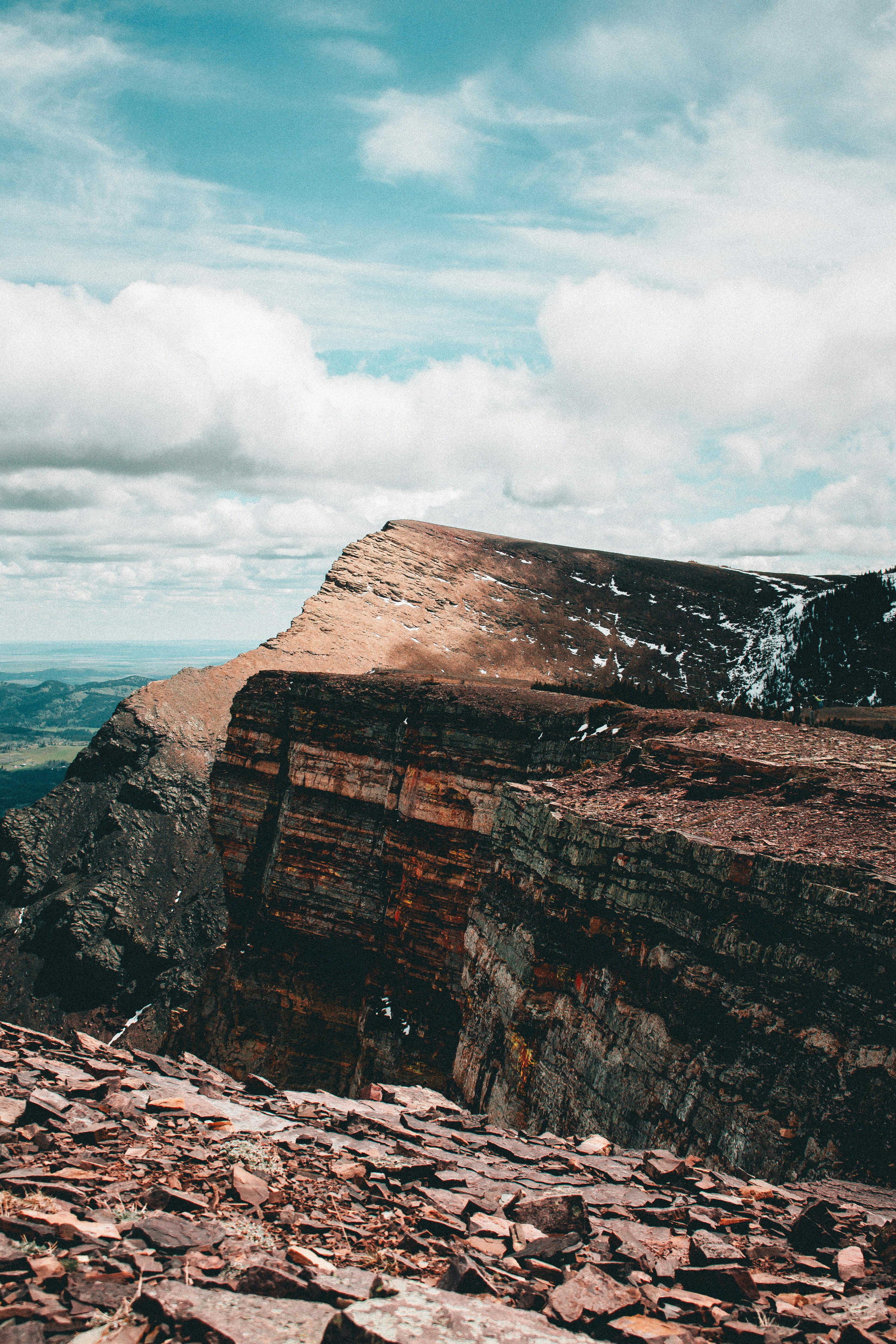 a man standing on top of a rocky mountain