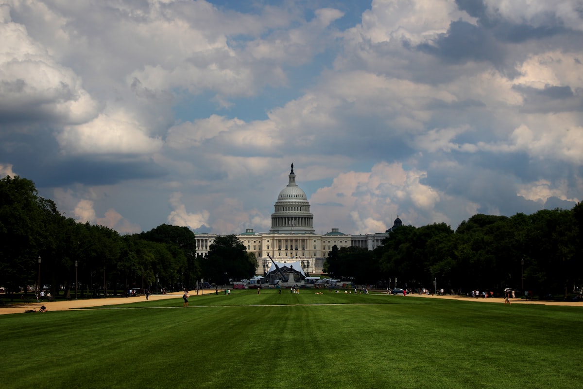 The United States Capitol building viewed from across the lawn in Washington DC, representing federal government policy and legislation