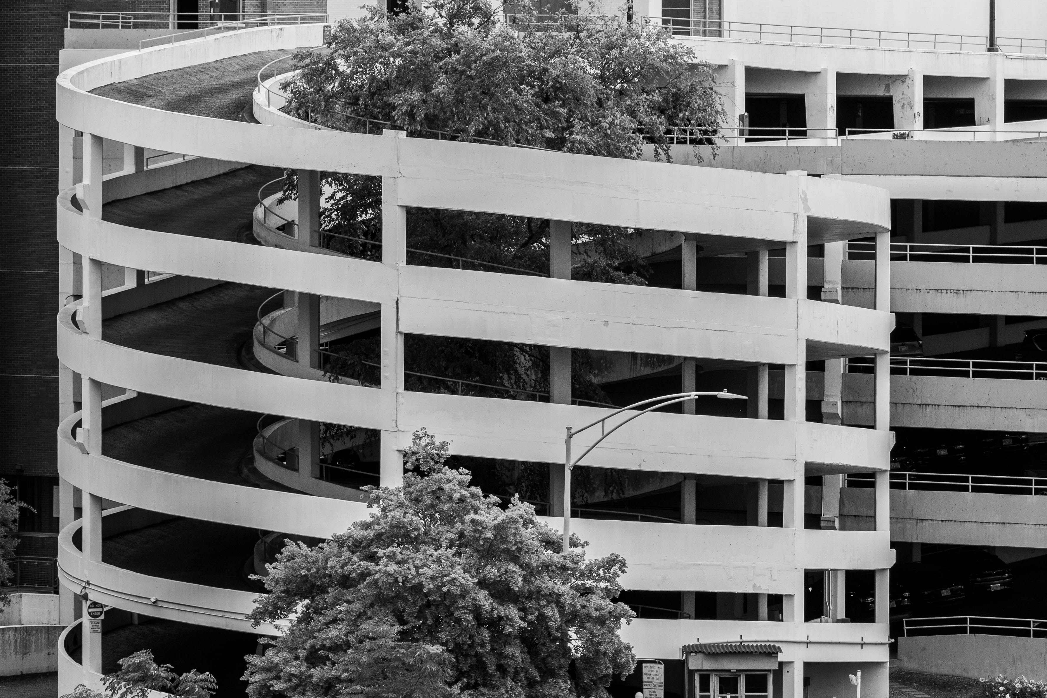 a black and white photo of an apartment building