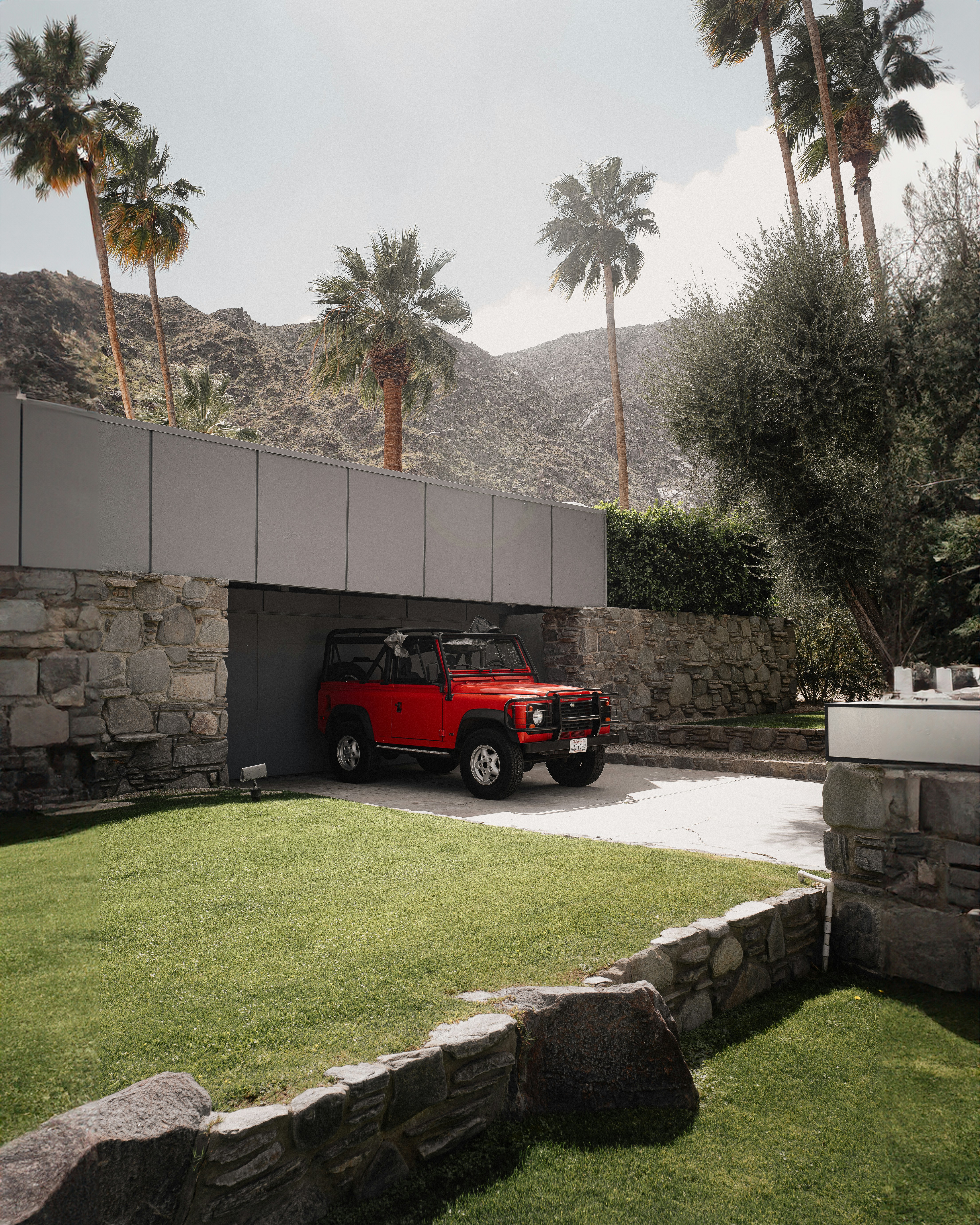a red truck is parked in a garage
