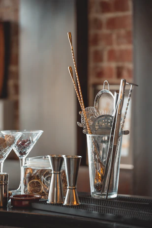 a set of bar accessories on a bar