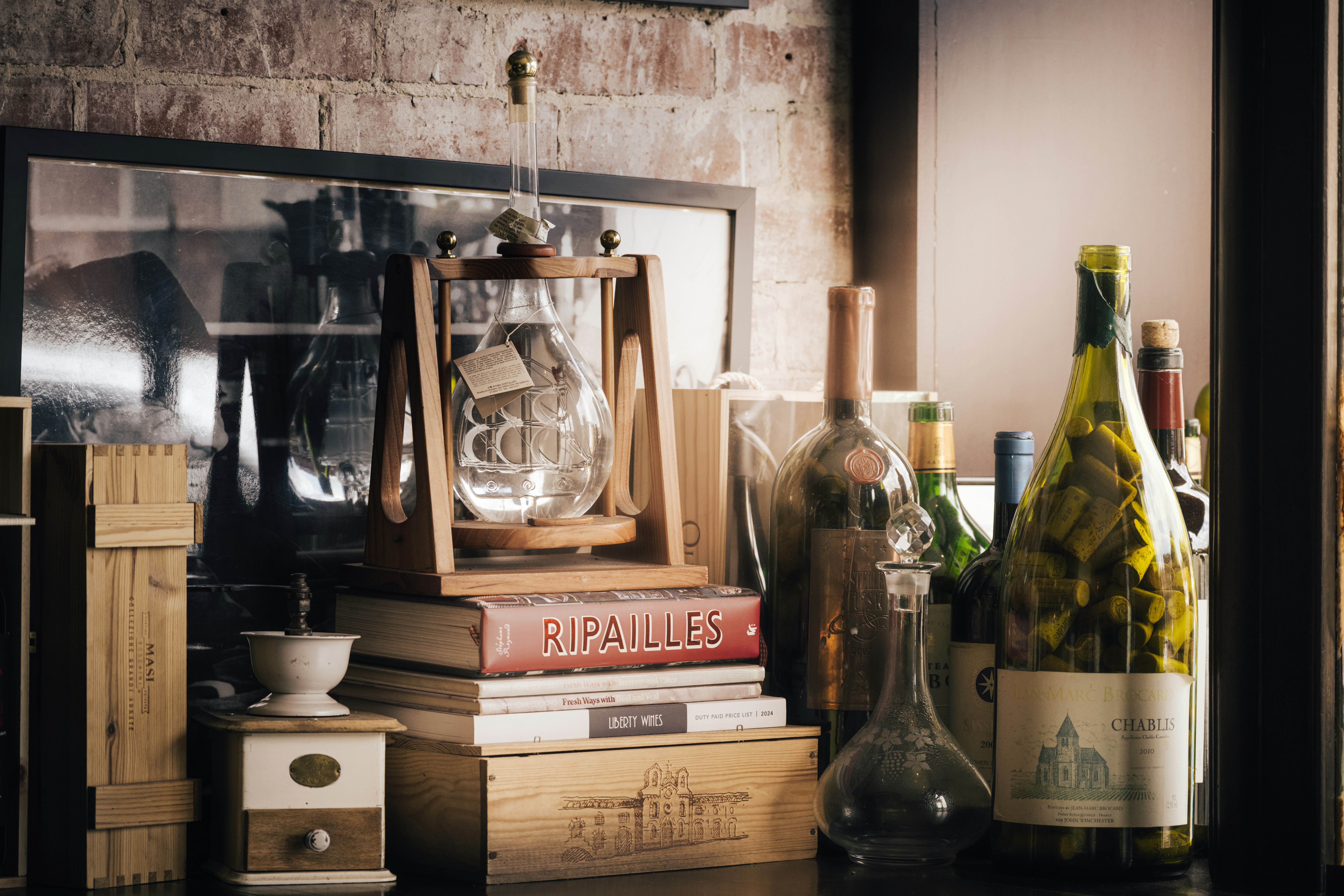 a table topped with lots of bottles of wine