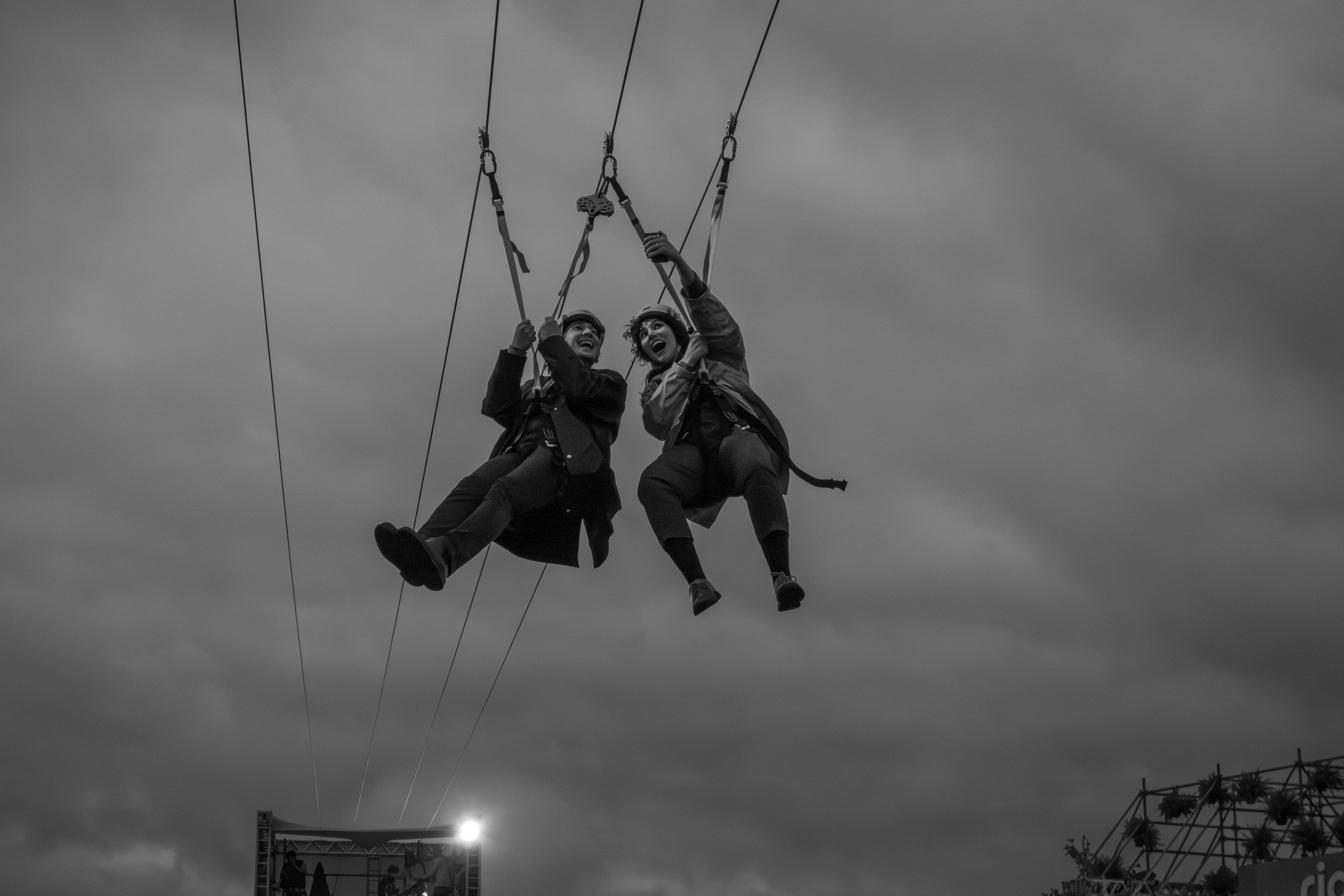 a couple of people that are in the air