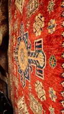 a close up of a rug on a wall