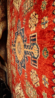 a close up of a rug on a wall