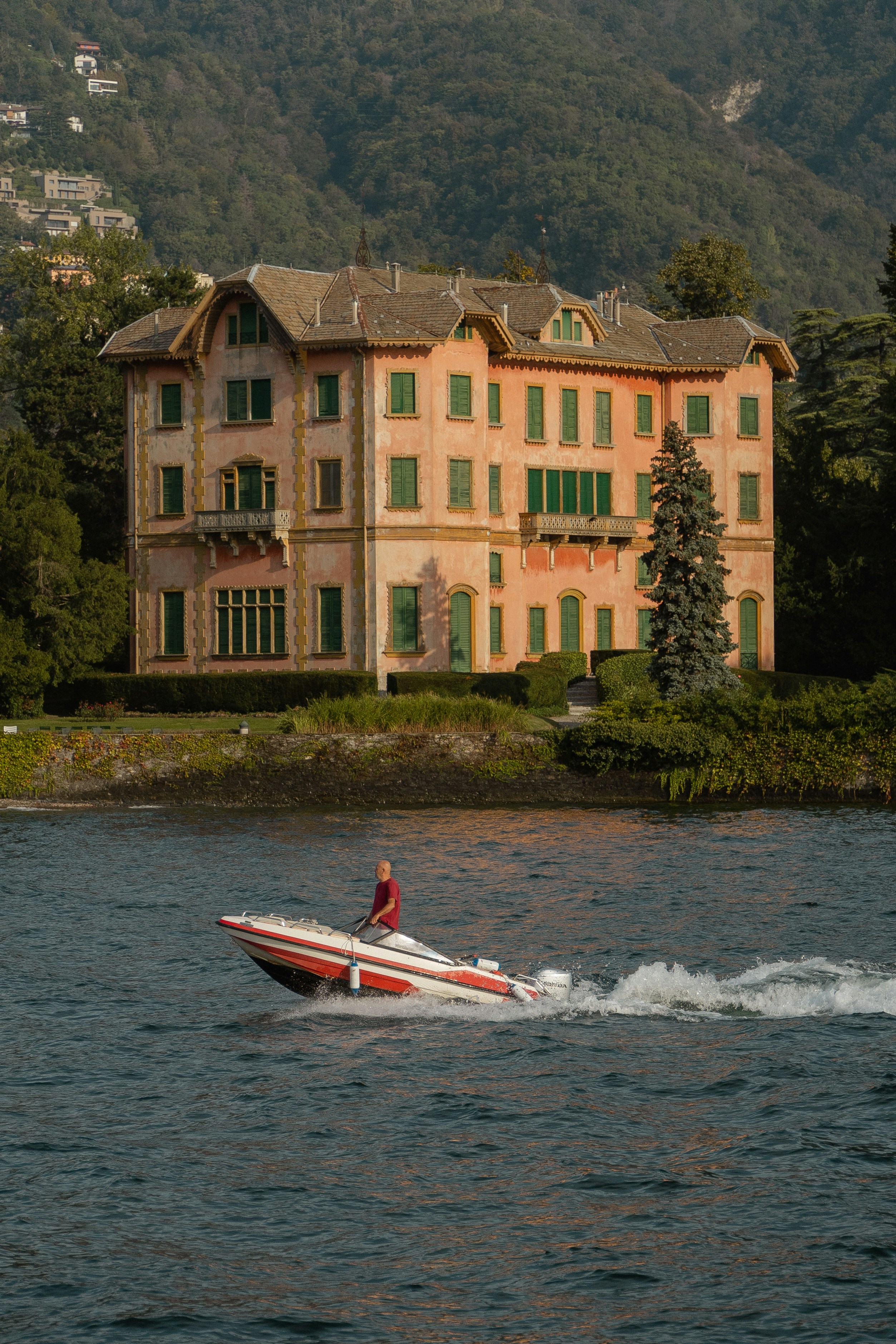 a man riding a jet ski on top of a lake