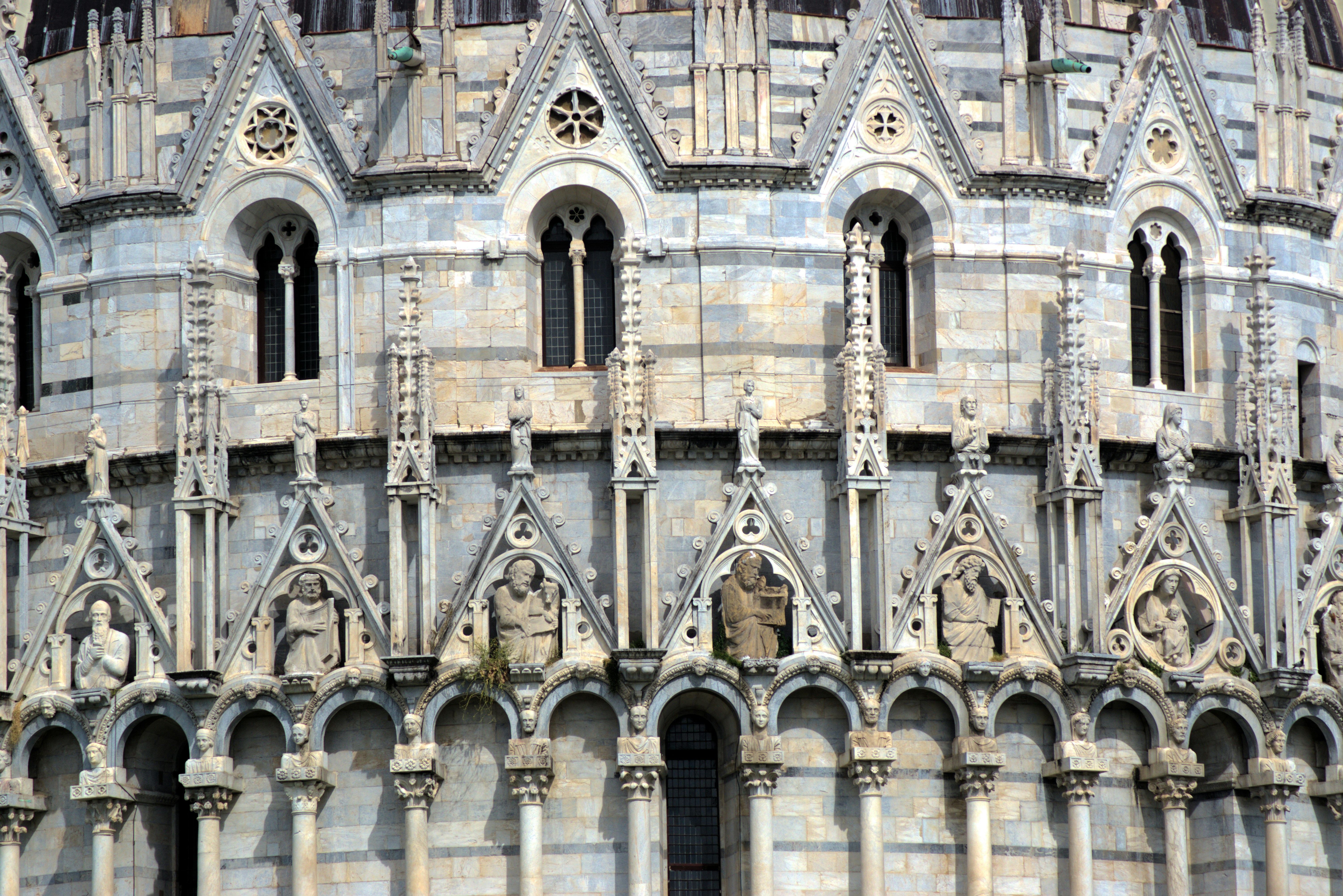 a very tall building with a clock on it's side