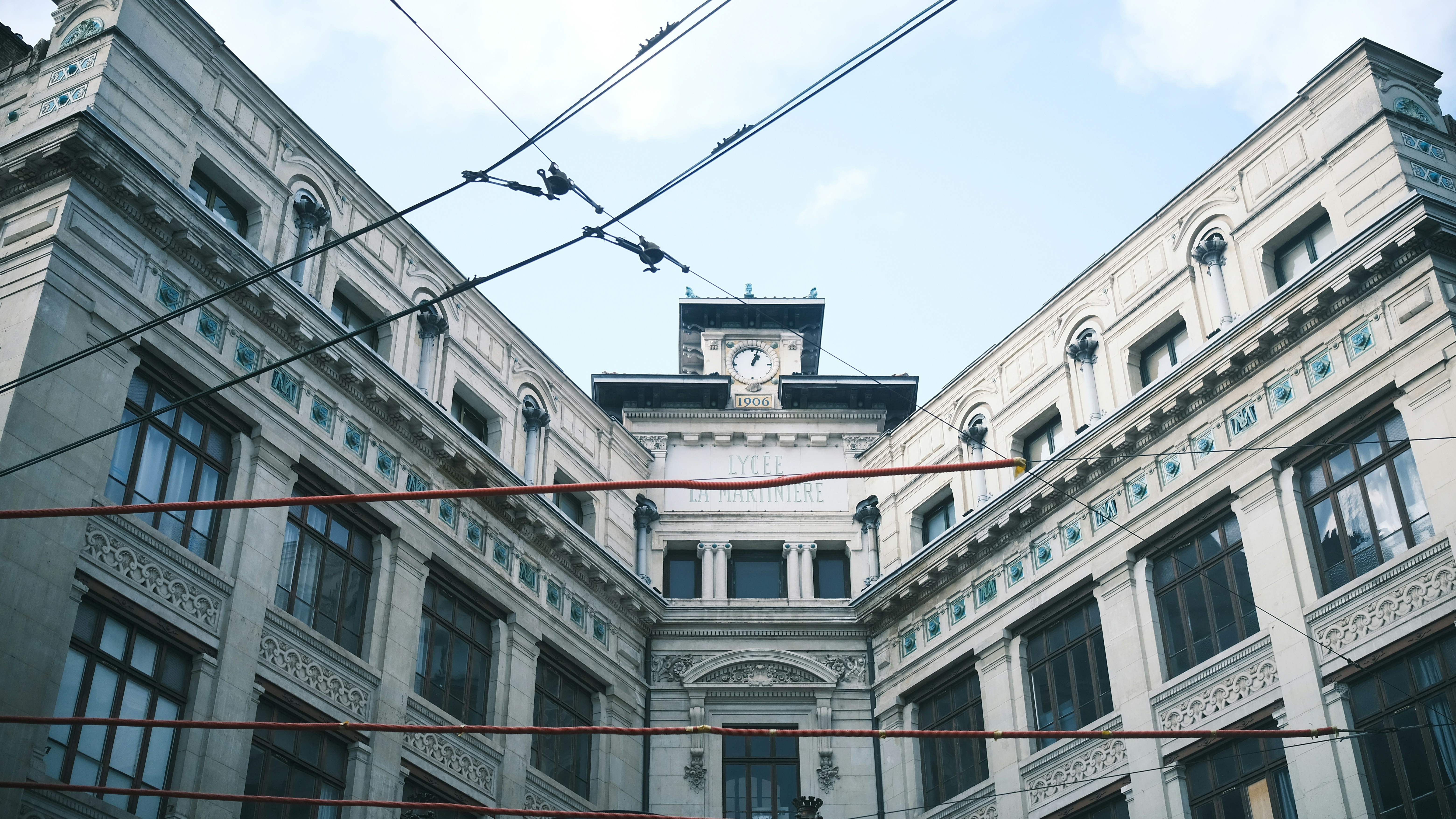 a large building with a clock on the top of it