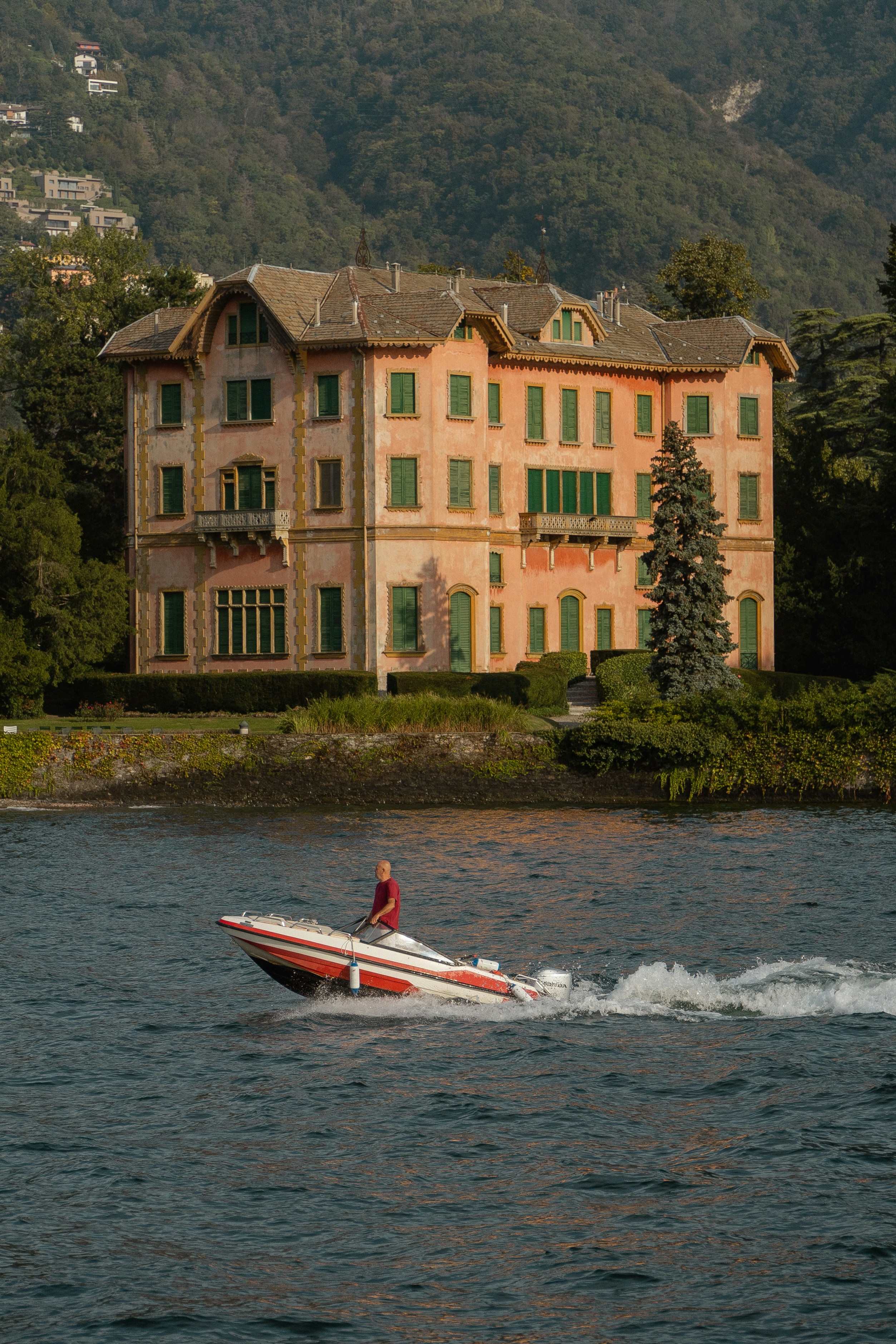 a man riding a jet ski on top of a lake